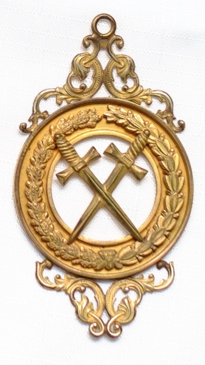 The jewel of the Grand Sword Bearer, worn by William A. Withers at the cornerstone dedication of what is now Holiday Hall in 1888. Photograph courtesy of the Grand Lodge of A.F. & A.M. of NC